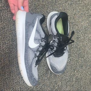 Gray Nike running shoes